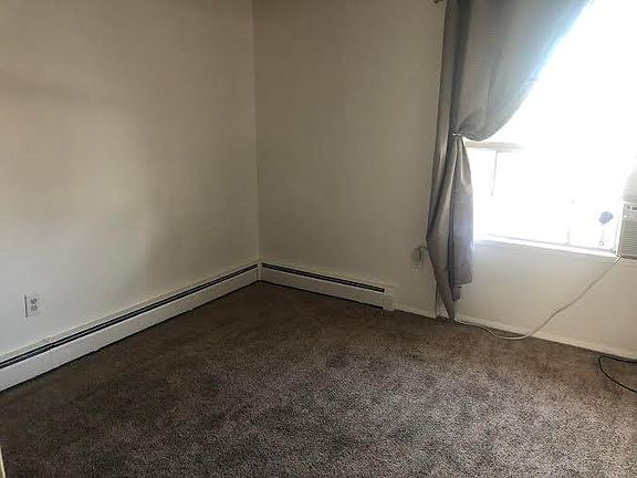 Front bedroom with window air conditioner