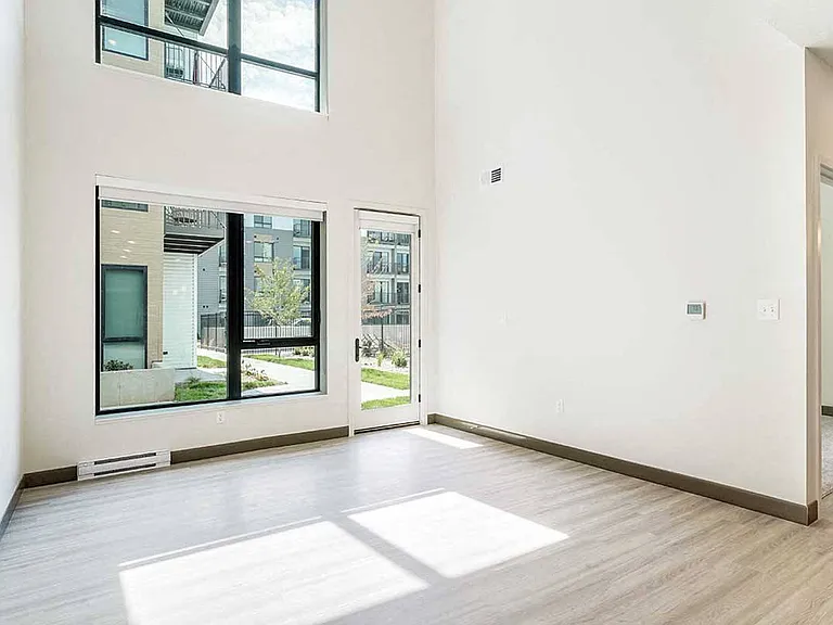 Massive windows and ultra-high ceilings make our town homes feel extra spacious.