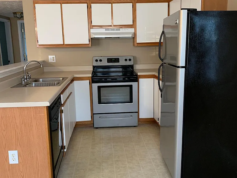 Kitchen with stainless steel appliances.