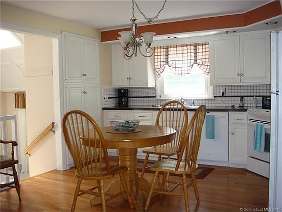 Eat in kitchen with ample counter space and pantry. Electric range, dishwasher