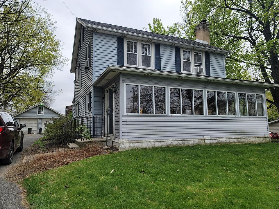 Front of house - door leads to sunroom in front of house