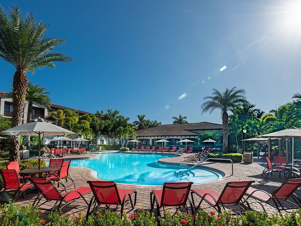 Resort-Style Pool with tanning chairs