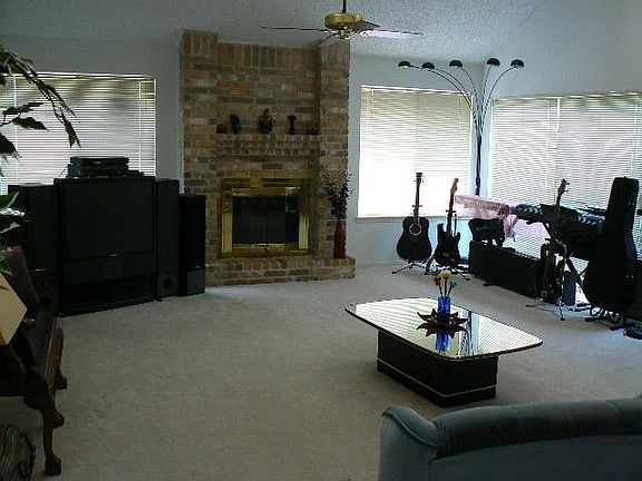 HUGE family room with cozy fireplace & cathedral ceiling!