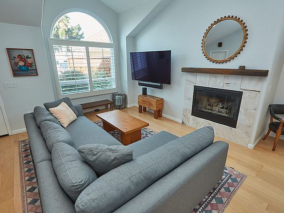 Living room with gas fireplace.