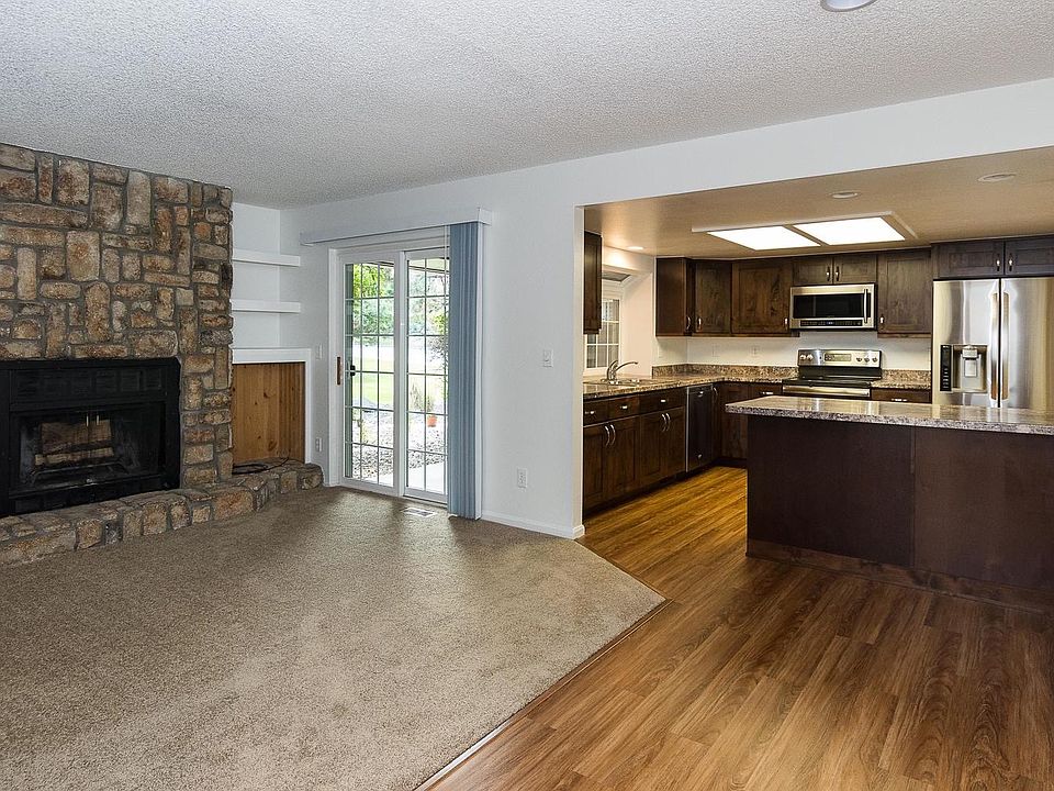 Open floor plan, living room opens to covered patio, New Car