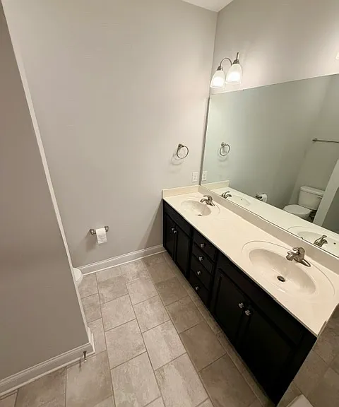 Master bathroom (Jack and Jill sink, toilet behind)