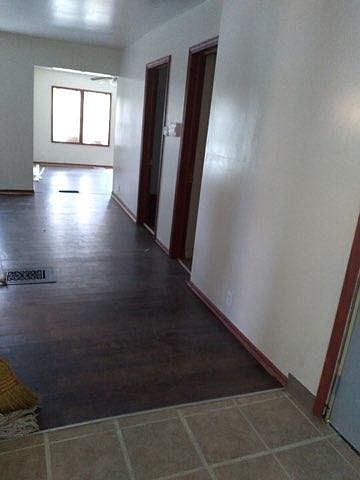 Wide, long hallway.