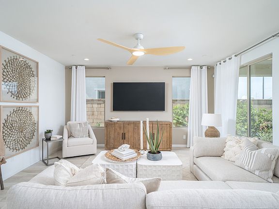 Gathering room with bright windows to bring in natural lighting.