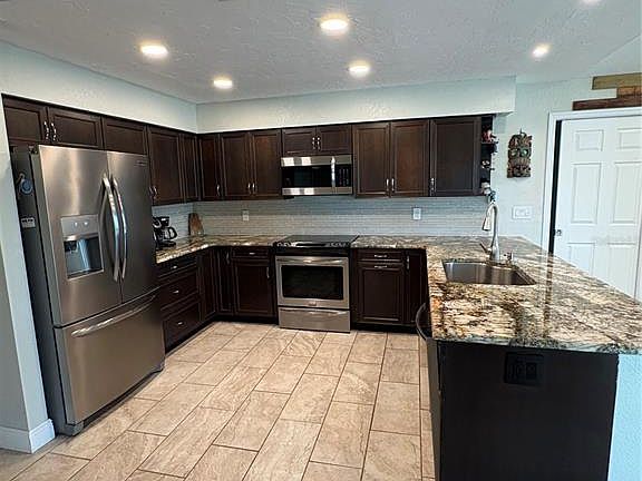 4th image of 5092 KILTY COURT E