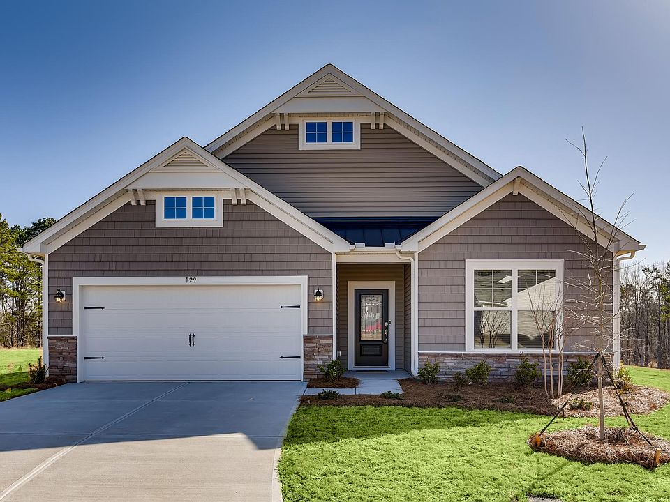 Great curb appeal. Best lot on the street! Prior pictures were taken when grass was dormant so grass was artificially enhanced with green color in this pic.