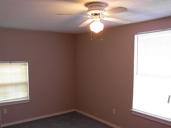 one of the back bedrooms.  all bedrooms has new beige paint