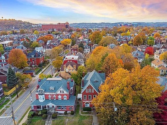 Aerial view of house and neighborhood.