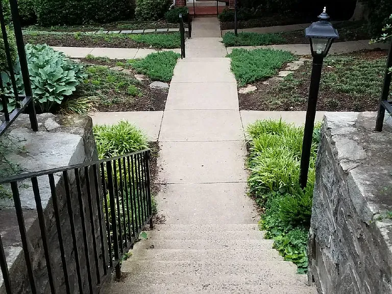 Stairs leading down to the building. It is not handicap accessible.