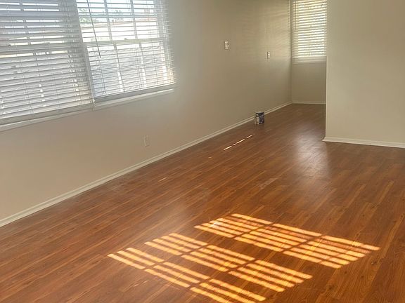 Living room. Wood flooring throughout.
