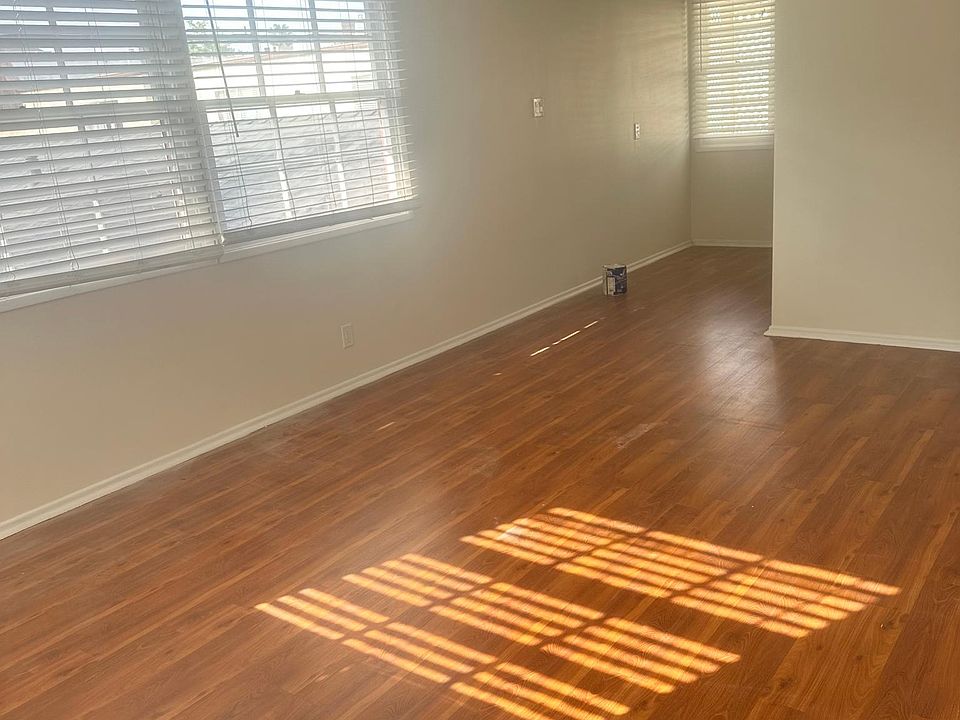 Living room. Wood flooring throughout.