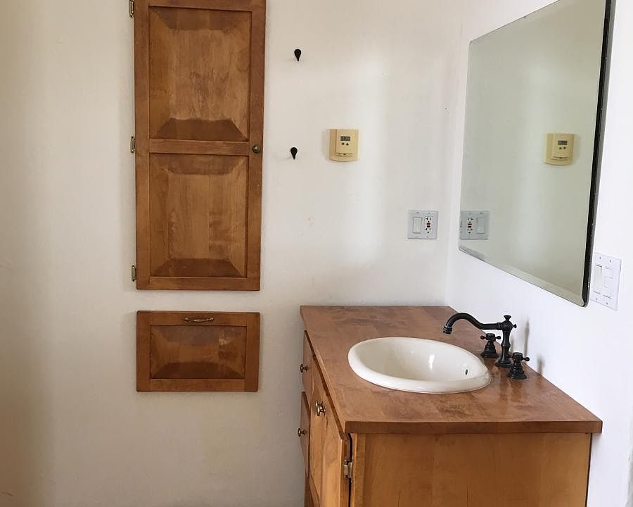 master bath vanity, mirror, laundry drip