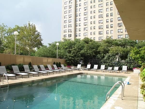 Heated Pool and landscaped pool deck