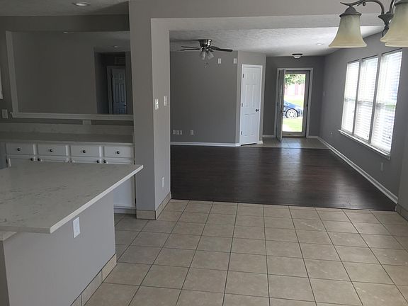 Large open concept GR right off the kitchen. All new hardwo