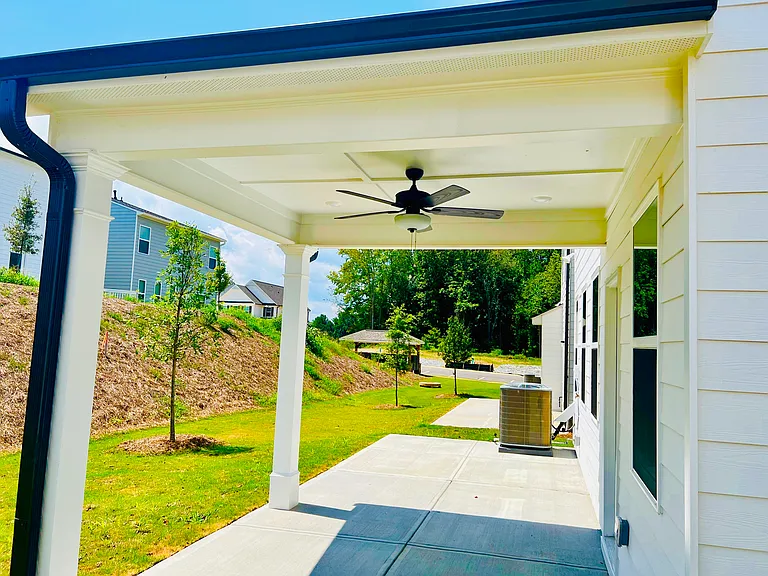 Backyard with Spacious Covered Porch and extended Patio