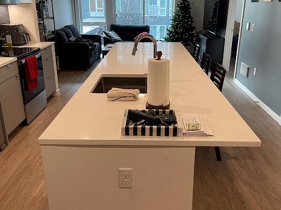 Massive kitchen island with countertop overhang for seating