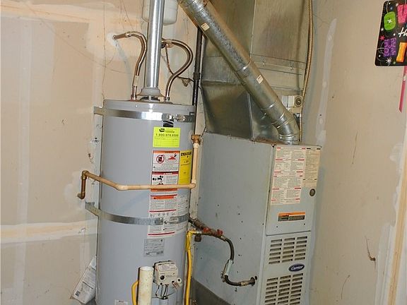 Gas furnace and hot water tank.