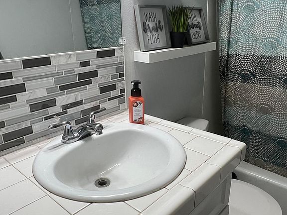 occupied so please disregard personal items.