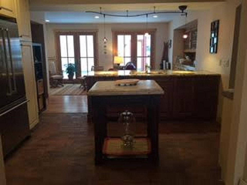 View of kitchen area to back of lower level. 
