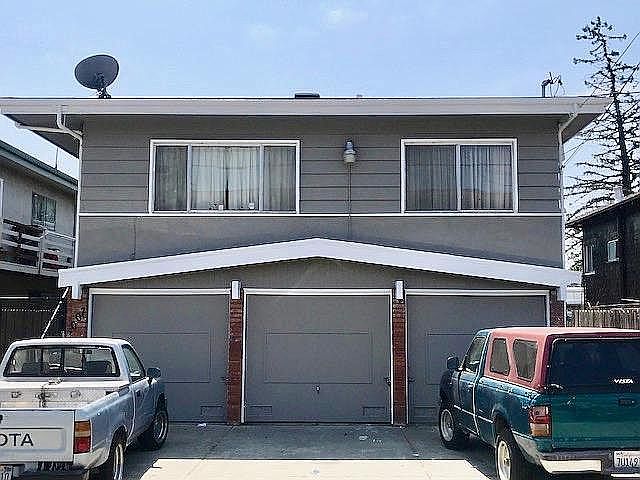 Front of Building - fresh paint, assigned garage spot is on