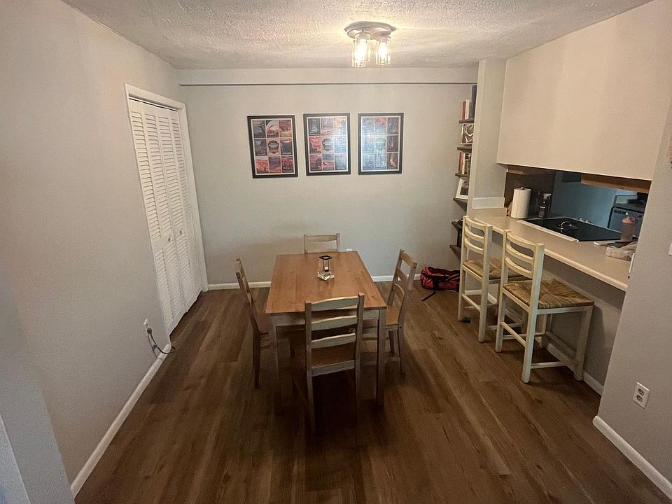 Dining room with breakfast bar and laundry closet