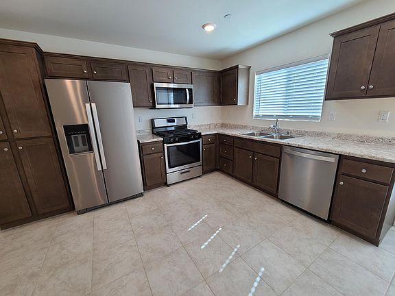 Kitchen with all stainless appliances
