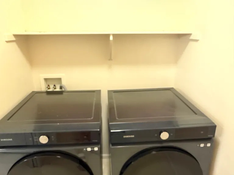 Laundry room with washer & dryer included.