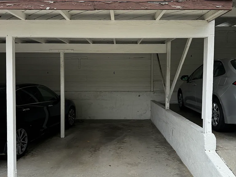 Carport behind the building on Stancrest Dr
