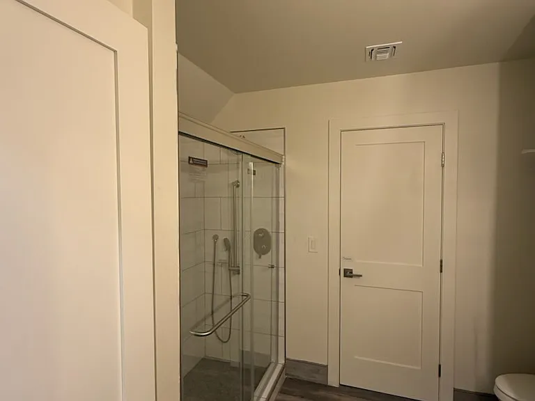 Same downstair bathroom showing its east side door closed