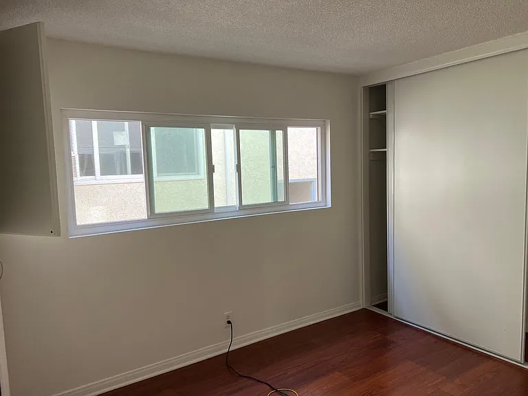 Large closet including linen closet in bedroom - new blinds to be installed