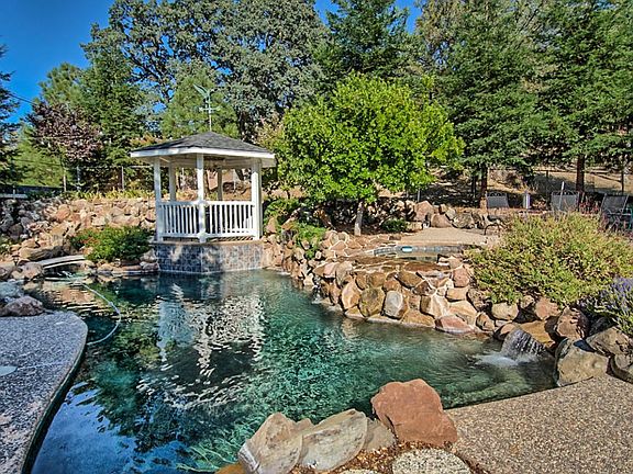 Pool with spa above