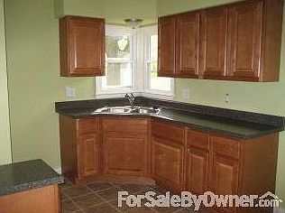 Kitchen : Lots of natural light! New cabinets, counters, sink, faucet & light fixtures!