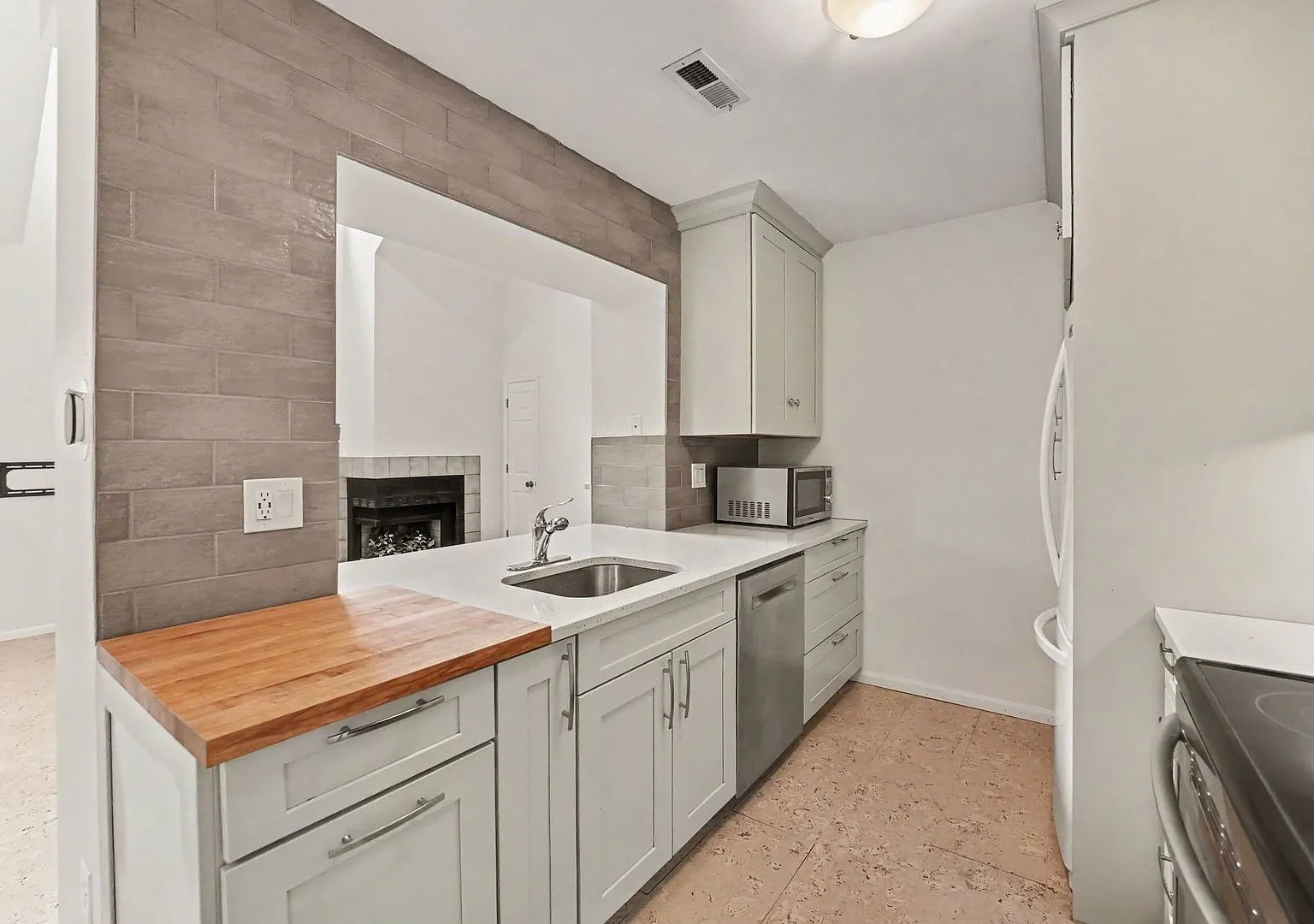 Bright Top-Floor 2 Bed, 2 Bath Condo with Loft & Vaulted Ceilings — Photo 4