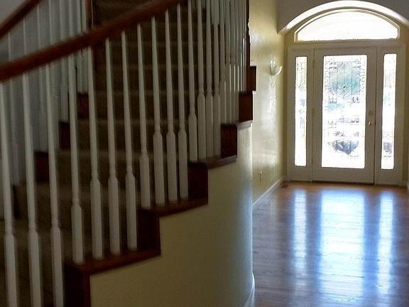 entrance with staircase and loft