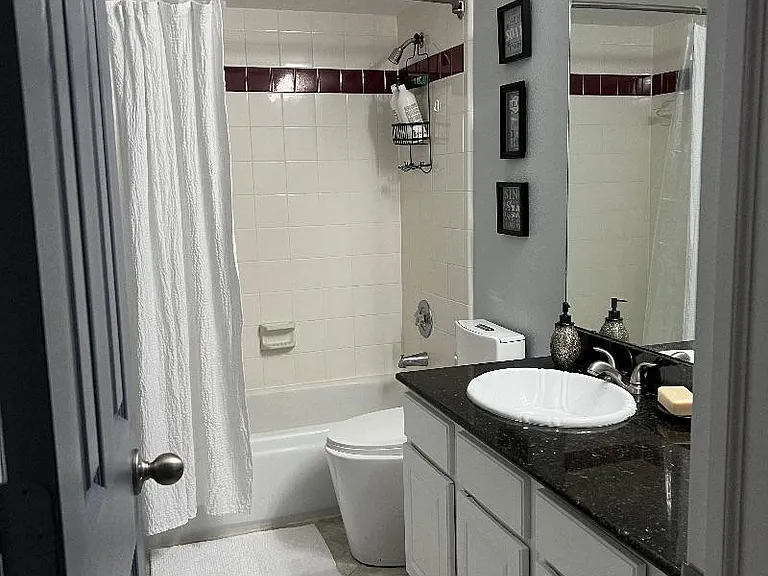 Soak away your stress or quick wash under rain shower head, your choice