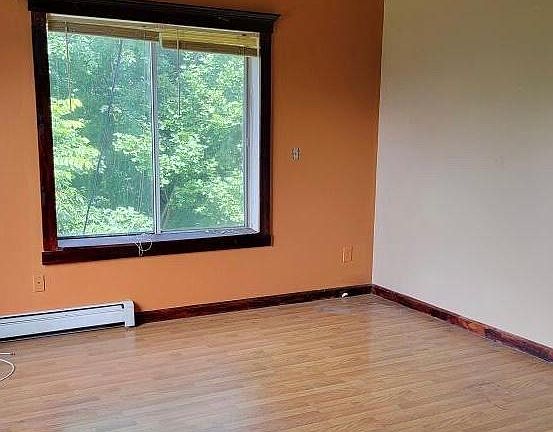 Primary bedroom with high ceilings