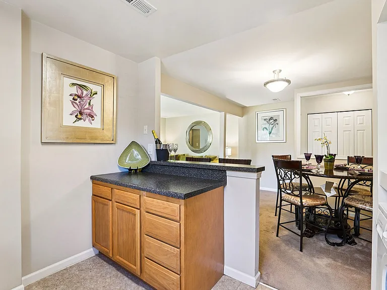 2BR, 1.5BA - 939SF - Model - Kitchen and Dining Area