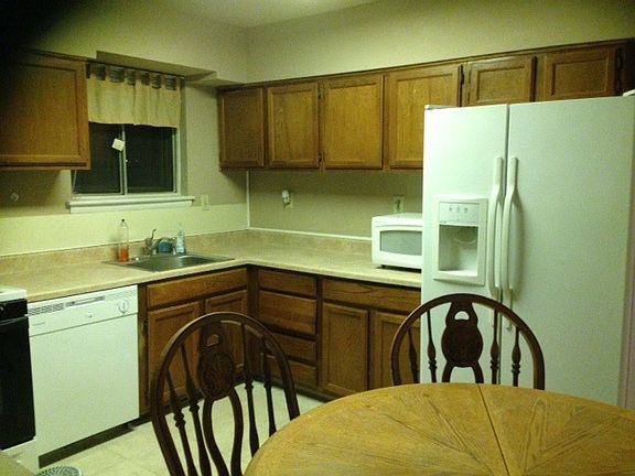 Kitchen with brand new dishwasher and garbage disposal