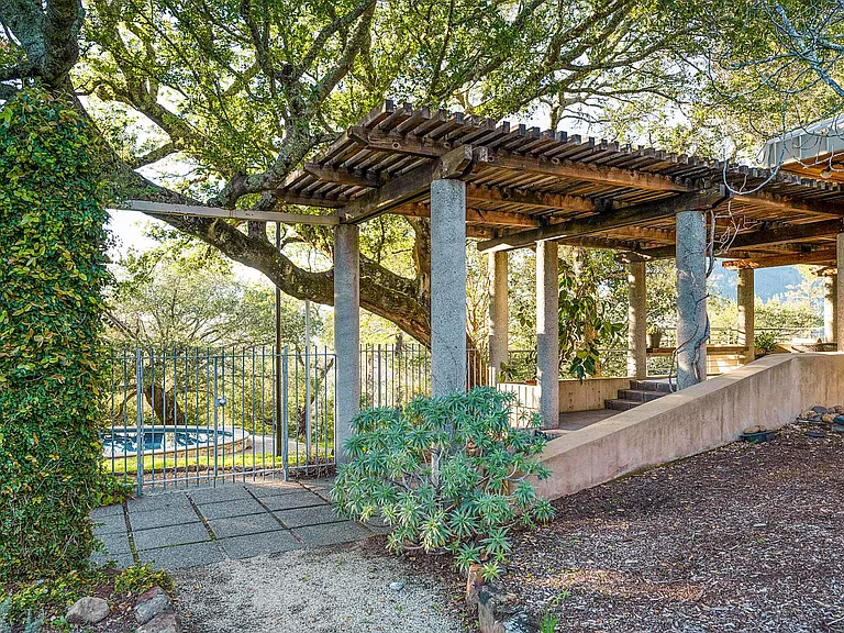 Stairs from Living Room Patio to Garden and Pool