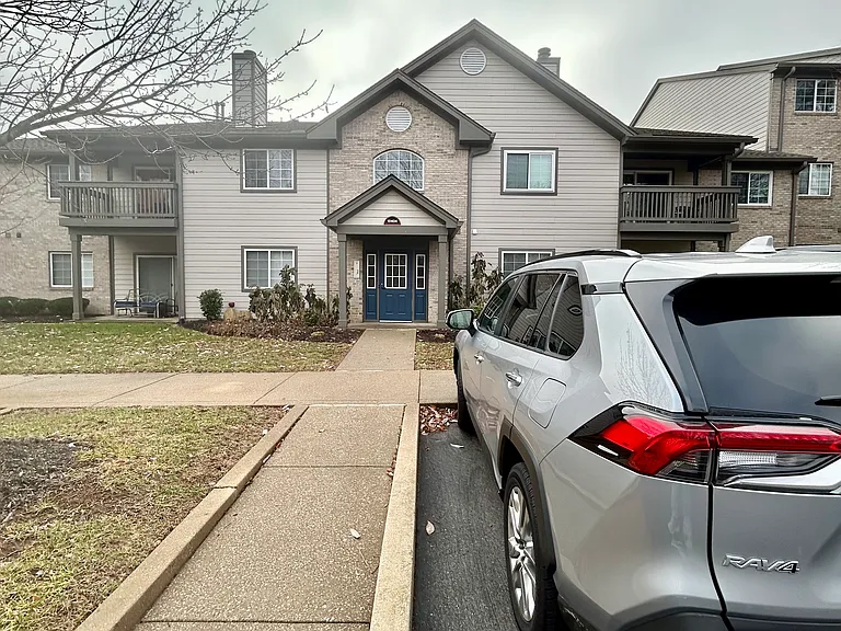 Assigned parking in front of entrance.