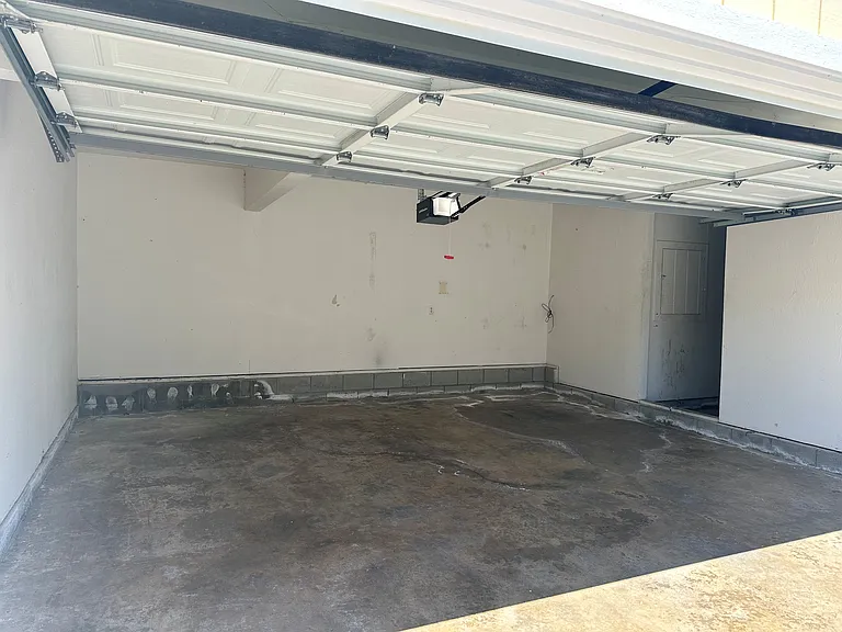 Double car garage with storage area