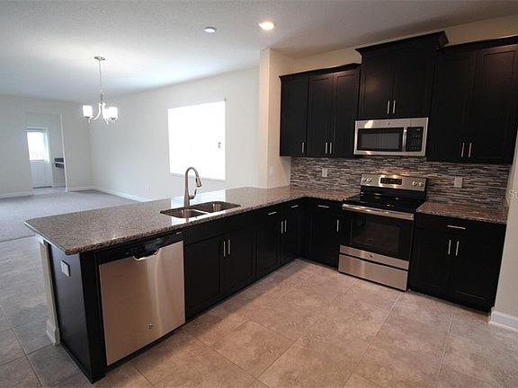 4th image of 11025 Sycamore Woods Dr