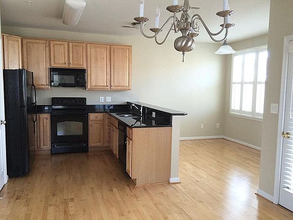 Kitchen/Dining/Door to Balcony