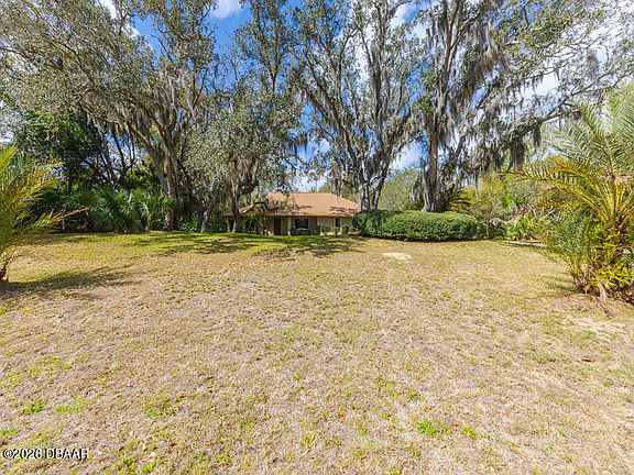 5th image of 5822 Spruce Creek Woods Dr