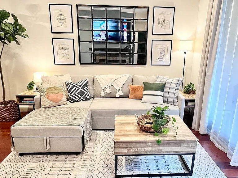 New Pottery Barn slipcovered sectional that converts to a large chaise for cozy movie nights or a king bed for an extra guest.