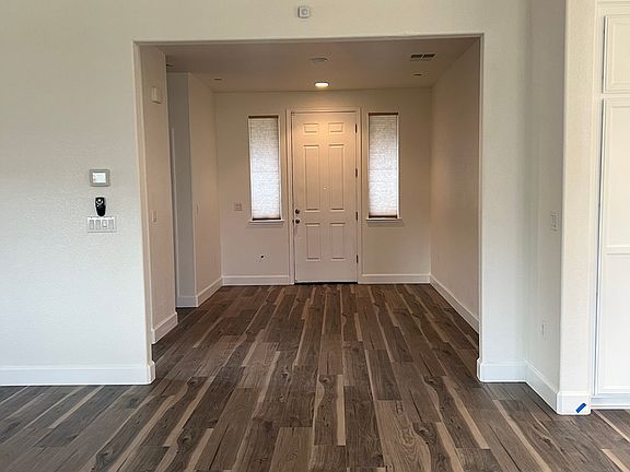 NEW flooring throughout the 1st floor. This is the front door